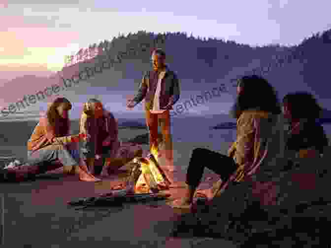 A Group Of People Sitting Around A Campfire On The Beach. The Of Puka Puka: A Lone Trader In The South Pacific (Eland Classics)