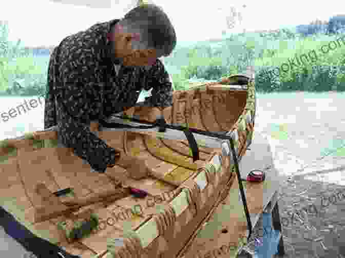Native American Craftsman Using Natural Materials To Construct A Bark Canoe, Showcasing Their Intricate Techniques The Survival Of The Bark Canoe